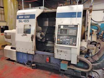 Model VMB-1600 CNC Vertical Machining Center; S/N 7051, 50 Taper Spindle, 6,000 RPM, 35 HP Spindle, 31-1/2 x 66-1/2 Table, Travels: X= 62.