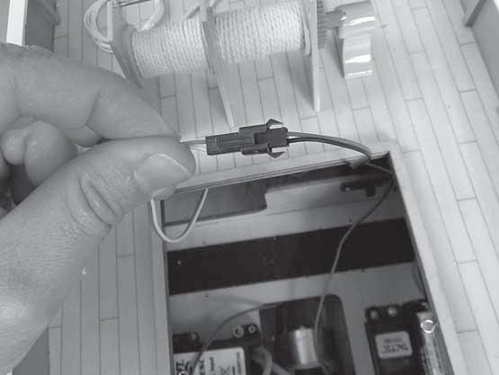 A hemostat helps greatly in fishing the wire in place.