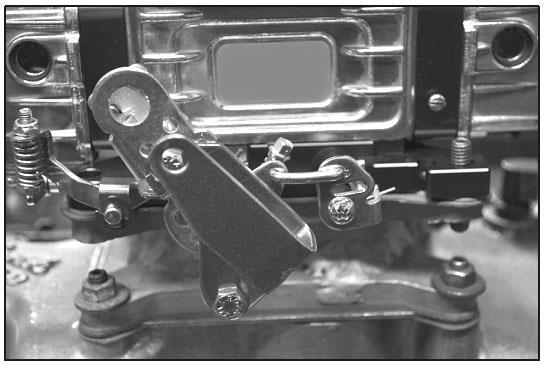 CHRYSLER APPLICATIONS: Attach throttle lever extension to throttle linkage as shown in Figure 5. Use Chrysler Throttle Lever Extension P/N 49-7. STARTING THE ENGINE: Figure 5 1.