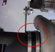 Mount bracket under both clamps, do not tighten till bar is inserted between both brackets.