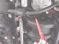 BREATHER HOSE Remove current breather hose from valve cover -There is a new breather hose