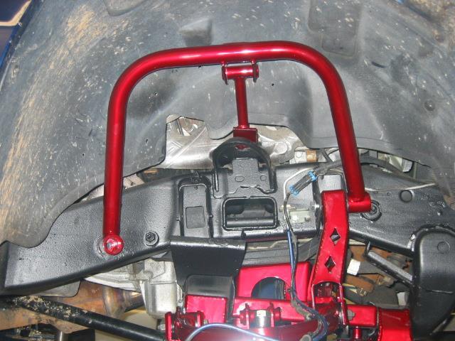 If installing dual front shock kit, install lower shock mount brackets around factory upper control arm.