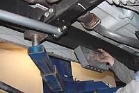 Reattach front of drive driveshaft to front differential with factory hardware and tighten as shown. Use Blue Loctite on front drive shaft bolts. 50.