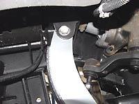 Position front upper control arm mount into