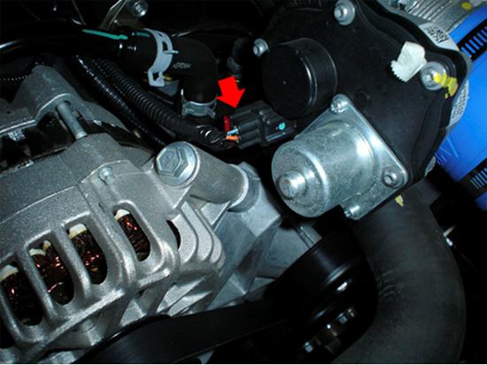 system. There are 2 electrical connections on the left and right side of the throttle body unit, as pictured below.