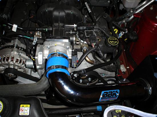 Figure 9: V6 Engine with throttle body and spacer attached. Cold Air Intake and power reattached 13.