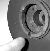bore of the inner drive magnet. Using a soft arbor, press into place until the bushing reaches the shoulder molded into the inner drive (figures 24 and 25).