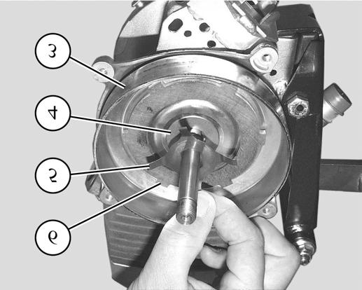 adjusting the clutch) Fit to the crank assembly in the following order: - the washer (2) (the chamfer (A)