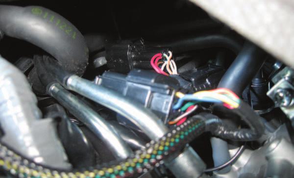 FIG.D 7 Plug the Ignition Module wiring harness in-line of the stock wiring harness and coil stick harness (Fig.