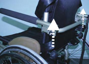 Grasp the wheelchair at the