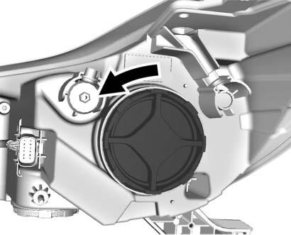 2. Remove the headlamp bulb access cover. 3. Turn the bulb counterclockwise and pull straight back. 4. Disconnect the wiring harness connector from the bulb. 5.