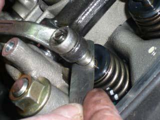 If it still won't go in you need to unlock the locknut (9mm nut.) and wind out the adjuster a bit.