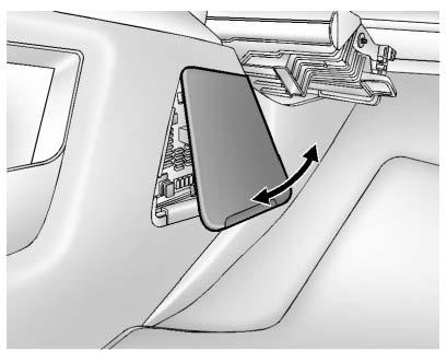 10-34 Vehicle Care Instrument Panel Fuse Block To reinstall the door, insert the tabs on the top of the door into the