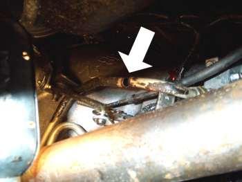 Clean the ends of the cut pipe and then remove the short portion and fitting from the transmission.