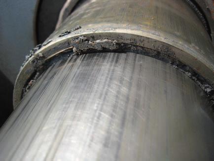 tubes. If the telescoping tubes are not adequately moistened with silicone grease, the asphalt will adhere to the metal.