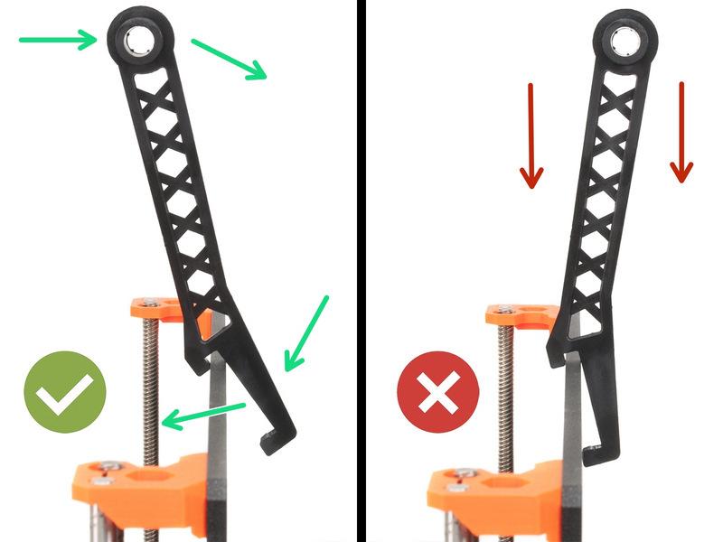 Don't try to assemble spool holder by pushing it only from the top.