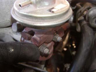 16) Remove the two 12mm bolts on the backside of the upper intake manifold near the PCV valve.