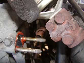 23) Remove EGR valve. 24) Unplug the 3 coil pack connectors. 25) Remove the six 10mm bolts on the coil packs.