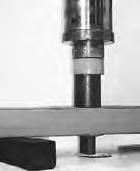 Place the support beam in a shop press on top of a receiving tool with both ends of the support beam squarely supported on the press bed. 9.