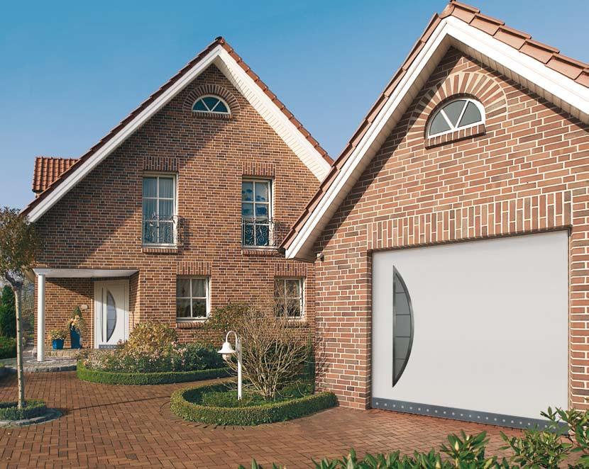 Tip In the past, the entrance door was the sole visiting card, but now you can also create an eye-catching garage door design that is just as beautiful.