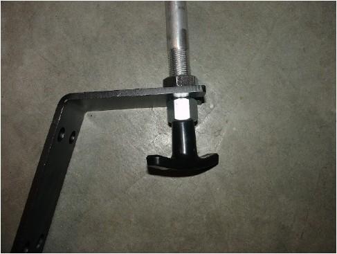 The T-handle mounting bracket can now be wall mount to desired height. Once mounted you will need to verify the functionality of the brake release cable along with the functioning of the manual hoist.