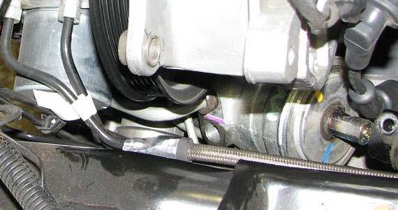 Place a catch pan below the steering gear then use an 18mm line