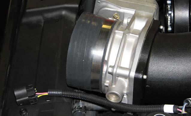 Route the supplied MAF wire harness near the driver side of the throttle body. 210.