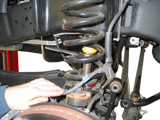 Remove the coil spring and lower seat as an assembly. Repeat for other side. Illustration1 3. Disconnect the sway bar end links from the sway bar and axle bracket. See illustration 2.