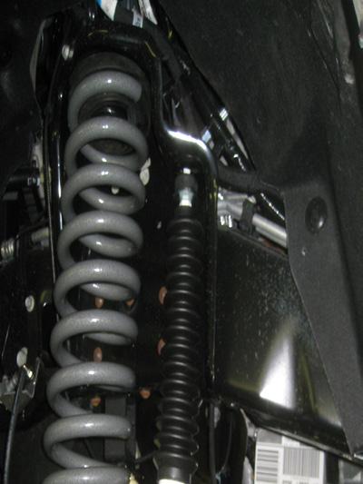 28. Locate the new front shocks.