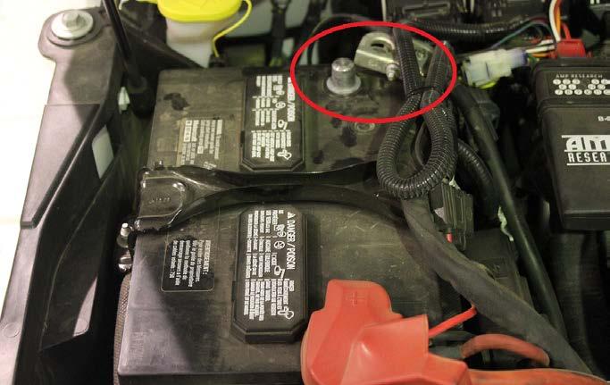 Unplug the water in fuel sensor connector from the bottom of the filter bowl and using a 1 1/4 drive socket, remove the fuel