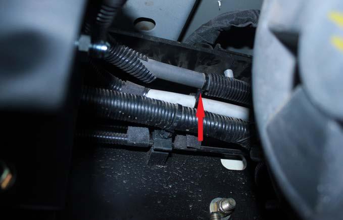 Install the factory fuel inlet and fuel outlet lines onto locking