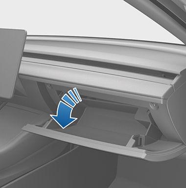 Interior Storage and Electronics Glove Box To open the glove box, touch Controls > Glovebox on the bottom corner of the touchscreen. The glovebox automatically opens and its light turns on.