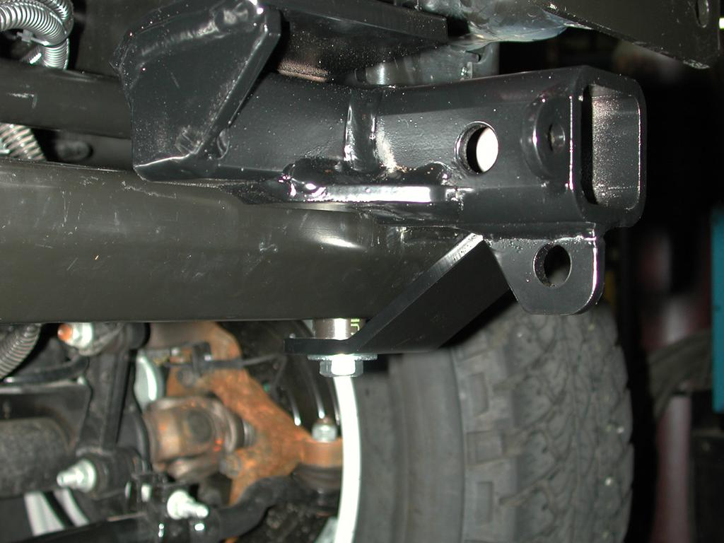 Now, clamp the passenger side main receiver brace to the bumper core (Fig.N). Note: use a cloth to prevent scratching the bumper core. 14.