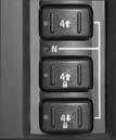 Transfer Case Buttons You can choose between four modes: The transfer case buttons are located to the right of the instrument panel cluster.