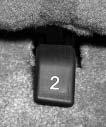 3. To unlatch the rear of the seat from the floor, pull up on the release