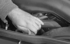 Engine Fan Noise 5. With the coolant surge tank pressure cap off, start the engine and let it run until you can feel the upper radiator hose getting hot. Watch out for the engine cooling fan.