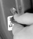 Turn the lock counterclockwise with your ignition key to engage the rear door security lock. 3. Close the door. 4. Do the same thing to the other rear door.