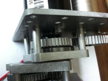 (am-0024) to the end of the bevel gear shaft with two Metal Washers (am- 065) on either side.