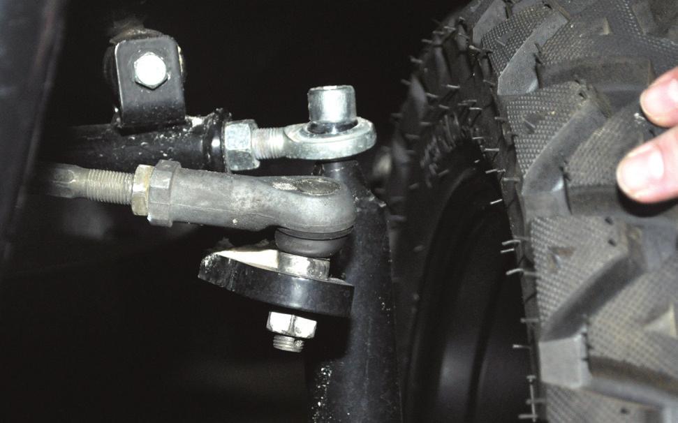 C IMPORTANT: Exposed tie rod threading should be equal on both tie rods.