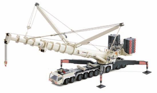 MODEL SHOW Below: Other new models on the Conrad stand included a Liebherr-liveried MAN TGX two-axle tractor with three-axle box trailer,