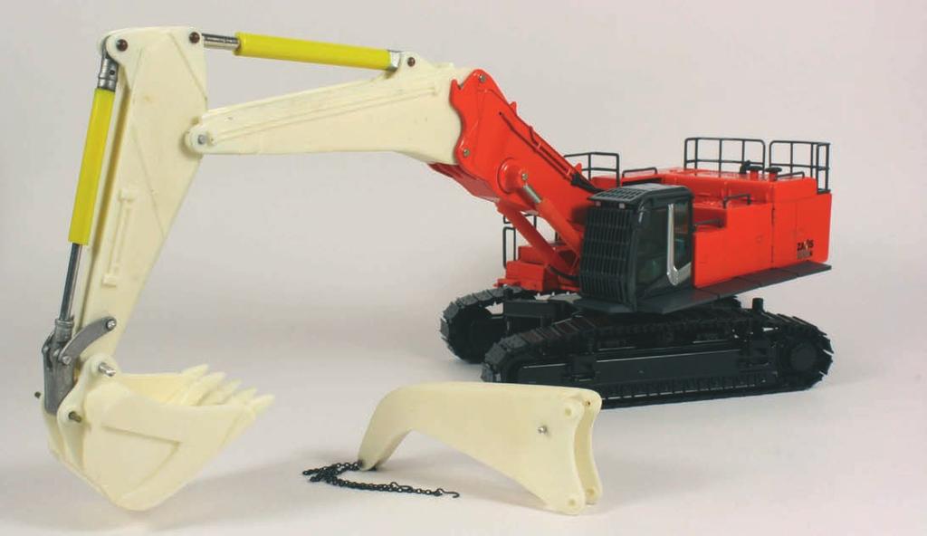 CUSTOMISING AT&C Die-Cast Models supplies an access ladder to fi t the Liebherr R996 backhoe or shovel.