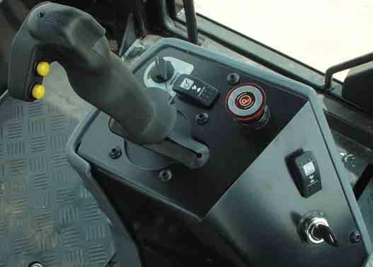 Steering console and instrumentation gauges are infinitely adjustable within the tilt range to the desired position of the operator. Entire console tilts for simple entrance and exit.