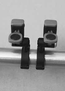Only loosen, if necessary, the clamp bolts of the brake and shifter slightly, slide them sideward to get space.