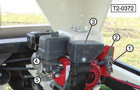 Turn the key switch to the START position to start the engine. When the engine starts, then release the key to allow it to return to the ON position. (1) Middle Auger Tube. (2) Upper Auger Tube.