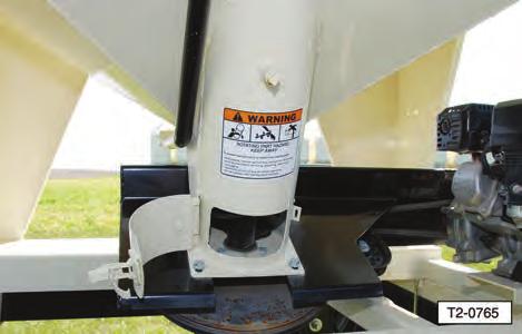 6 UNPLUGGING AUGER DELIVERY TUBE IMPORTANT Do not operate the auger when it is plugged with excess seed or is hindered from moving by a foreign object. Continued operation can cause damage.