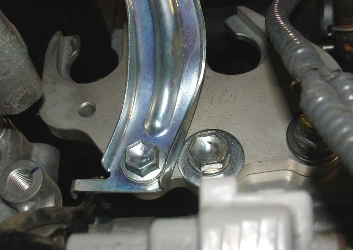 Install TRD cable bracket using the (2) 14mm factory bolts and (2) supplied washers. (Fig. D3) i.