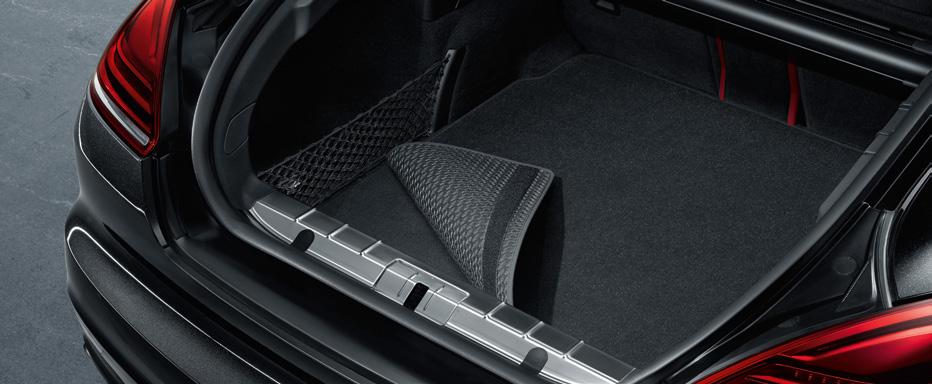 48 Interior Interior 49 [1] Reversible luggage compartment mat with nubuck edging This reversible mat with loading edge protection protects the vehicle