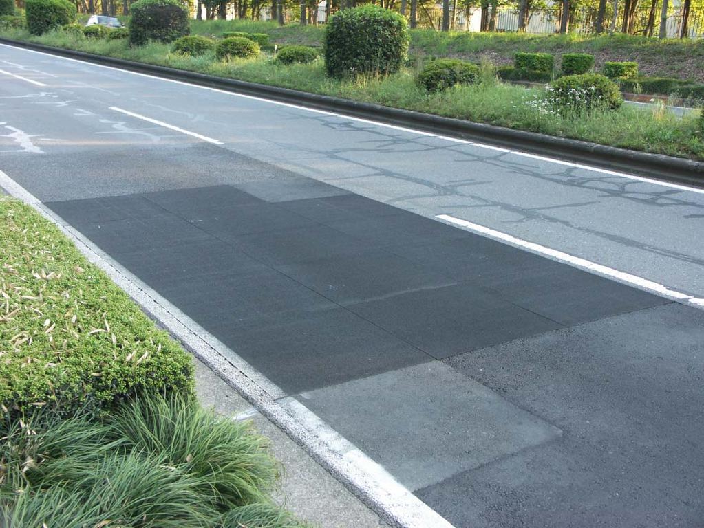 Improved poroelastic road surface laid on road with high traffic volume View after half a year Failed and