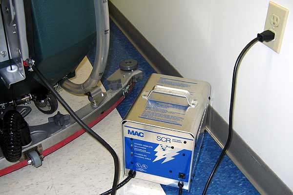 USING AN OFF- BOARD BATTERY CHARGER FOR SAFETY: When servicing machine, the use of incompatible battery chargers may damage battery packs and potentially cause a fire hazard.