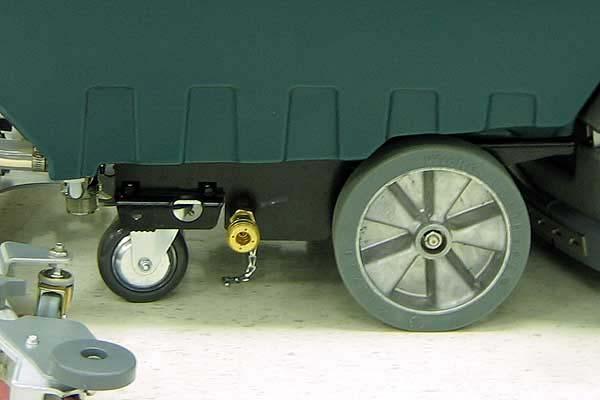 4. Set the parking brake, if equipped, and place a block behind each wheel to prevent the machine from rolling. 5. Secure with tie- down straps as shown (Figure 98).